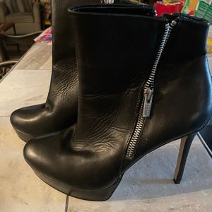 Dkny black leather boots. Paid 175.00. Only wore 1 time